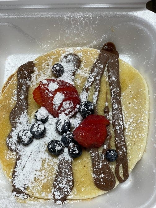 Pancakes Berries and Nutella.