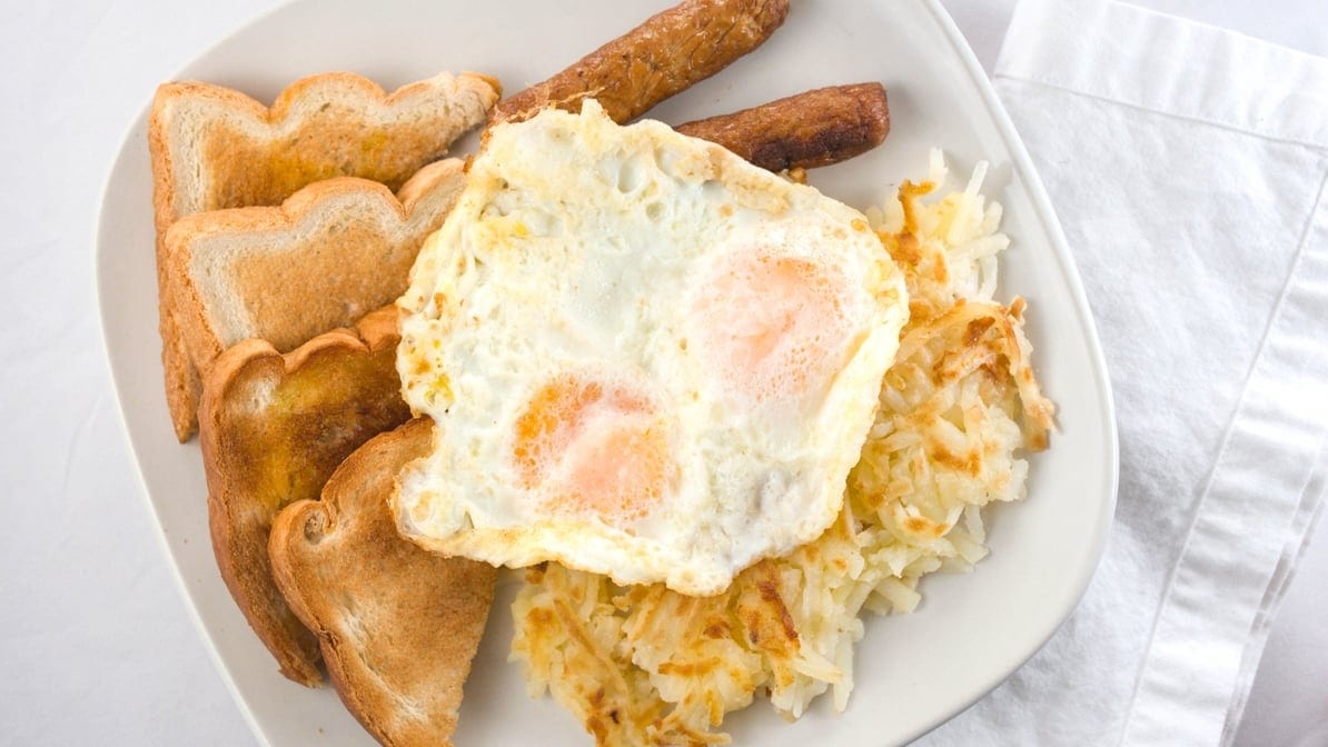 2 XL Eggs, Meat, Hash Browns, Toast & Jelly.