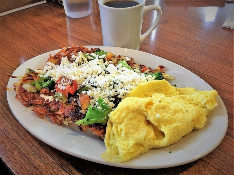 Corned Beef Hash with Eggs, Green Pepper & Onion, Toast & Jelly.